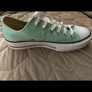 Womens All Star Converse Platform tennis shoes.